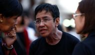 Maria Ressa (C), Chief Executive Officer of online media website Rappler, arrives to join a demonstration calling for press freedom in Quezon City, east of Manila, Philippines 19 January 2018.  EPA/ROLEX DELA PENA