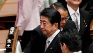 Prime Minister Shinzo Abe attends the opening of a session of parliament in Tokyo, Japan January 22, 2018. REUTERS/Kim Kyung-Hoon