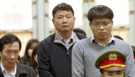  Dinh La Thang (C), former Chairman of the Member Council of PetroVietnam, stands trial in the courtroom in Hanoi, Vietnam, 22 January 2018. EPA/STR VIETNAM OUT