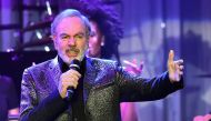 (FILES) This file photo taken on February 11, 2017 shows singer Neil Diamond performing during the annual Clive Davis pre-Grammy gala at the Beverly Hilton Hotel. AFP / Frederic J. BROWN