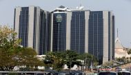 Central Bank of Nigeria's logo is seen on the headquarters building in Abuja, Nigeria January 22, 2018. Reuters/Afolabi Sotunde