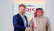 Khalifa Abdulla Turki Al Subaey (right), Group President & CEO of QIC Group with Kevin Spencer, founder and Chief Executive of for the Markerstudy Group.