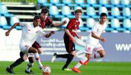 Action from the Al Kass Cup International match betwen AC Milan and Wydad at Aspire Academy in Doha yesterday.