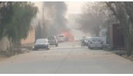 Smoke rises at the site of a blast near the office of the Save the Children aid agency in Jalalabad, Afghanistan, in this still image taken from Reuters TV footage, January 24, 2018. REUTERS/ReutersTV