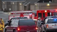 Police investigators are seen at the scene of a shooting at Marshall County High School in Benton, Kentucky, U.S., January 23, 2018. REUTERS/Harrison McClary

