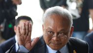 Thai former anti-government protest leader Suthep Thaugsuban waves as he arrives for a hearing at the Criminal Court, in Bangkok, Thailand, 24 January 2018. EPA/NARONG SANGNAK