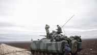 Turkish military tanks are prepared for deployment as part of the 
