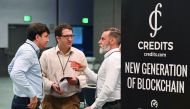 Attendees confer during the Crypto Funding Summit, which helps investors understand cryptocurrency, at the Convention Center in Los Angeles, California on January 24, 2018. Bitcoin, the leading cryptocurrency, is down from record highs approaching $20,000