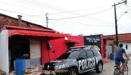 View of facade of the nightclub where 14 people were killed in an early Saturday shootout, in Fortaleza, northeastern brazil, on January 27, 2018. / AFP / Rodrigo CARVALHO