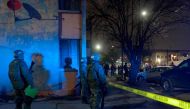 Members of the Mexican army patrol the area where seven people were killed inside a house, while they were watching a soccer game in Monterrey, Mexico on January 28, 2018.  AFP / Julio Cesar AGUILAR

