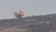 A photo taken from Turkey's Kilis province, on January 28, 2018 shows smokes rising at Burseya Mountain as Turkish military aircrafts and howitzers continue to hit PYD/PKK terror group targets within the 'Operation Olive Branch' launched in Syria's Afrin.
