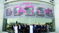 Officials of Al Hamad Automobiles Co and Al Meera during JAC trucks delivery. 