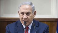 Israeli Prime Minister Benjamin netanyahu speaks during a cabinet meeting in Jerusalem on January 28, 2018. / AFP / POOL / Tsafrir Abayov

