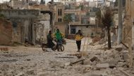 Damaged buildings are seen after Russian and Assad regime airstrikes hit Kafr Amin district of Syria's Idlib province, which is a part of a de-escalation zone.  Ubeyde Fad?l - Anadolu