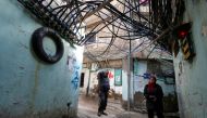 People walk in Burj al-Barajneh refugee camp in Beirut, Lebanon, January 29, 2018. Picture taken January 29, 2018. REUTERS/Mohamed Azakir