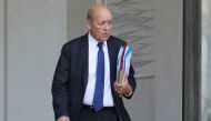 French Minister of Europe and Foreign Affairs Jean-Yves Le Drian leaves the Elysee presidential palace after a weekly cabinet meeting on January 24, 2018 in Paris. / AFP / LUDOVIC MARIN