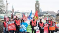 German metalworkers take part in a demonstration for higher pay on January 24, 2018 in Hamburg, northern Germany. AFP / DPA / Daniel Bockwoldt