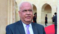 Saeb Erakat, the secretary general of the Palestine Liberation Organization (PLO), talks to the media after a meeting between the Palestinian Authority president and the Jordanian king at the Royal Palace in Amman on January 29, 2018. AFP / Khalil Mazraaw