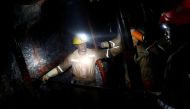 Miners work deep underground at Sibanye Gold's Masimthembe shaft in Westonaria, South Africa, April 3, 2017. Reuters/Mike Hutchings