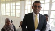 In this file photo taken on January 22, 2018 former president of the Maldives Mohamed Nasheed (C) arrives for a press conference in Colombo. AFP / Lakruwan Wanniarachchi