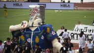 University students carry a parade float mocking Thailand's junta number two Prawit Wongsuwan over a current scandal over his undeclared collection of luxury watches, during the annual football match between Thammasat University and Chulalongkorn Universi