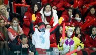 Supporters cheer during a women's ice hockey practice match between Sweden and a Unified Korean team in Incheon on February 4, 2018 ahead of the Pyeongchang 2018 Winter Olympic Games.  AFP / POOL / KIM HONG-JI