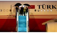 President of Turkey, Recep Tayyip Erdogan and his wife Emine Erdogan wave ahead of their departure for Italy at the Ataturk International Airport in Istanbul, Turkey on February 04, 2018. (Berk Özkan - Anadolu Agency)