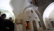 Prime Minister of Turkey, Binali Yildirim (2 L) inspects the Calik Mosque after a rocket fired by PYD/PKK terrorists from Syria hit the three centuries old Mosque in the Turkish border province of Kilis, Turkey on February 04, 2018 in Kilis, Turkey.  Haka