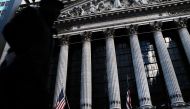 People walk by the New York Stock Exchange (NYSE) on February 5, 2018 in New York City. Spencer Platt/Getty Images/AFP