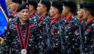 File photo of Philippine President Rodrigo Duterte, wearing a military uniform, reviews scout ranger troops upon his arrival during the 67th founding anniversary of the First Scout Ranger regiment in San Miguel town, Bulacan province, north of Manila, Phi