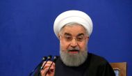 Iranian President Hassan Rouhani speaks during a press conference in Tehran on February 6, 2018, to mark the 39th anniversary of Iran's Islamic revolution. / AFP / ATTA KENARE