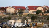 Israeli troops gather at the scene of a stabbing attack north of Hebron, in the occupied West Bank, February 7, 2018. REUTERS/Mussa Qawasma 