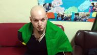 This handout picture released by the Italian Carabinieri Press Office on February 3, 2018 shows an Italian man arrested for suspected of wounding several foreign nationals in a drive-by shooting in Macerata.  AFP Photo /Italian Carabinieri Press Office