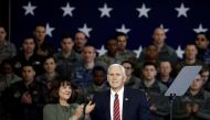 U.S. Vice President Mike Pence arrives with his wife Karen to address members of U.S. military services and Japan Self-Defense Force (JSDF) before he departs for South Korea, at U.S. Air Force Yokota base in Fussa, on the outskirts of Tokyo, Japan, Februa