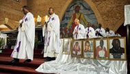 Priests hold a mass for citizens killed in recent protests, at the Cathedral of Our Lady of Congo in Kinshasa, Democratic Republic of Congo February 9, 2018. Reuters/Robert Carrubba