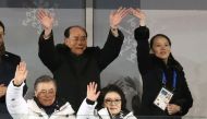 South Korean President Moon Jae-in and his wife Kim Jung-sook, North Korea's nominal head of state Kim Yong Nam, and North Korean leader Kim Jong Un's younger sister Kim Yo Jong wave at the Winter Olympics opening ceremony in Pyeongchang, South Korea Febr