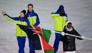 Kenya‘s flagbearer Sabrina Simader leads the delegation parade during the opening ceremony of the Pyeongchang 2018 Winter Olympic Games at the Pyeongchang Stadium on February 9, 2018. AFP / Martin Bureau