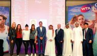 (From left) Russia’s Elena Vesnina, Daria Kasatkina, Tunisian player Ons Jabeur, Oman’s Fatima Al Nabhani  pose for a photograph with Qatar Tennis Federation and Qatar Total officials following the Qatar Total Open 2018 official draw ceremony held in Doha