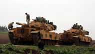 A photo taken from Turkey's Hatay province shows military vehicles are being transported to border units as Turkish Armed Forces hit PYD/PKK terror group targets within the 'Operation Olive Branch' launched in Syria's Afrin, on February 11, 2018. Hüseyin 