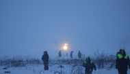 Emergency services work at the scene where a short-haul regional Antonov AN-148 plane crashed after taking off from Moscow's Domodedovo airport, outside Moscow, Russia February 11, 2018. REUTERS/Maxim Shemetov