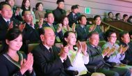 This photo taken on February 11, 2018 by North Korea's official Korean Central News Agency (KCNA) shows South Korea's President Moon Jae-in (3rd R), North Korean leader Kim Jong Un's sister Kim Yo Jong (3rd L) and North Korea's ceremonial head of state Ki