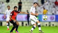 Al Sadd’s Xavi Hernandez (left) in action in this file photo