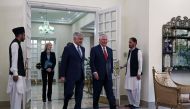US Secretary of State Rex Tillerson walks with Pakistani Foreign Minister Khawaja Asif as he arrives at the Prime Ministers residence in Islamabad on October 24, 2017. 
(AFP / Alex Brandon) 