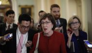 Sen. Susan Collins (R-ME) speaks with reporters on Capitol Hill on February 14, 2018 in Washington, DC. Aaron P. Bernstein/Getty Images/AFP