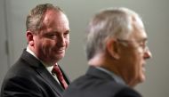 (FILES) This file photo taken on July Australia's Deputy Prime Minister Barnaby Joyce (L) looking at Prime Minister Malcolm Turnbull (R) during a press conference in Sydney. AFP / William West 