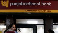 People wait in a queue outside a Punjab National Bank ATM in New Delhi, India, February 16, 2018. REUTERS/Saumya Khandelwal	
