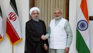 Iranian President Hassan Rouhani (L) shake hands with Indian Prime Minister Narendra Modi before a meeting at Hyderabad house in New Delhi on February 17, 2018. AFP / MONEY SHARMA

