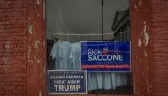 A window announcing support for Congressional candidate Rick Saccone is seen on High Street in Waynesburg, Pennsylvania, US, February 14, 2018. REUTERS/Maranie Staab