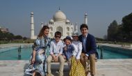 Prime Minister of Canada Justin Trudeau, his wife Sophie Gregoire and his children pose for a photograph during their visit to Taj Mahal in Agra on February 18, 2018. (AFP / MONEY SHARMA)