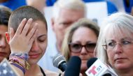 :(FILES) In this file photo taken on February 17, 2018 Marjory Stoneman Douglas High School student Emma Gonzalez reacts during her speech at a rally for gun control at the Broward County Federal Courthouse in Fort Lauderdale, Florida on February 17, 2018